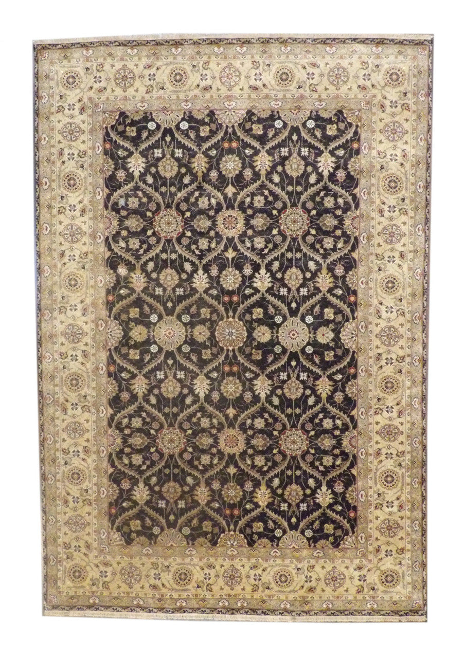 Fine Persian Mashad hand-knotted wool-silk rug in black and gold, full view