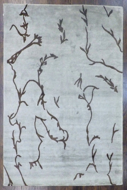 Modern leaves design hand-knotted wool-silk rug in blue and brown, full view