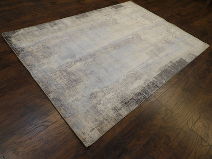 Abstract broken pattern detail, oxidized blue rug