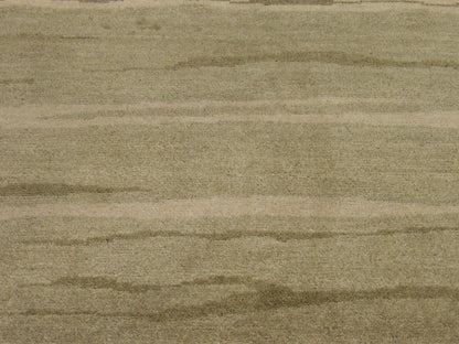 Wool texture close-up, green modern rug