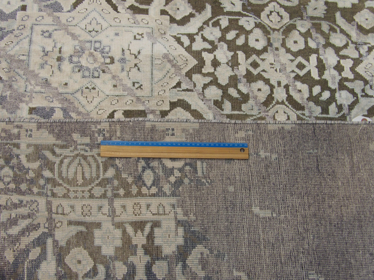 Full room view of modern fine abstract hand-knotted rug