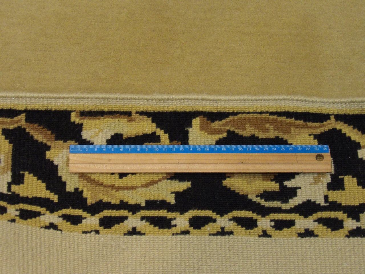Black & Gold European Abusson rug in room setting