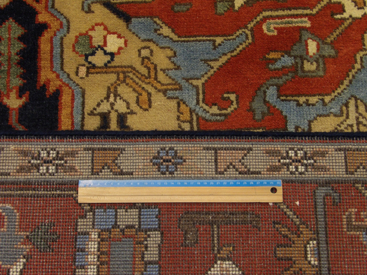 Blue & Red Persian Tribal Serapi rug in room setting