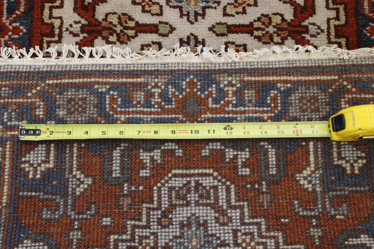 Tribal Indo Heriz rug corner detail