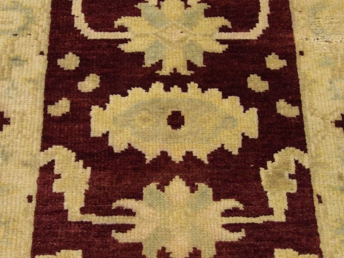 Back of Oushak hand-knotted rug