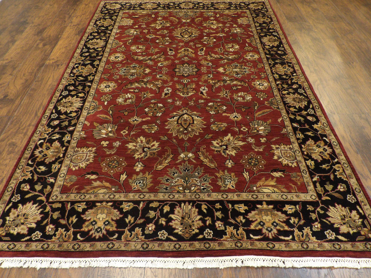 Back of hand-knotted Jaipur Kashan rug showing construction