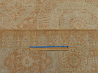 Beige and rust Mamluk rug in room setting