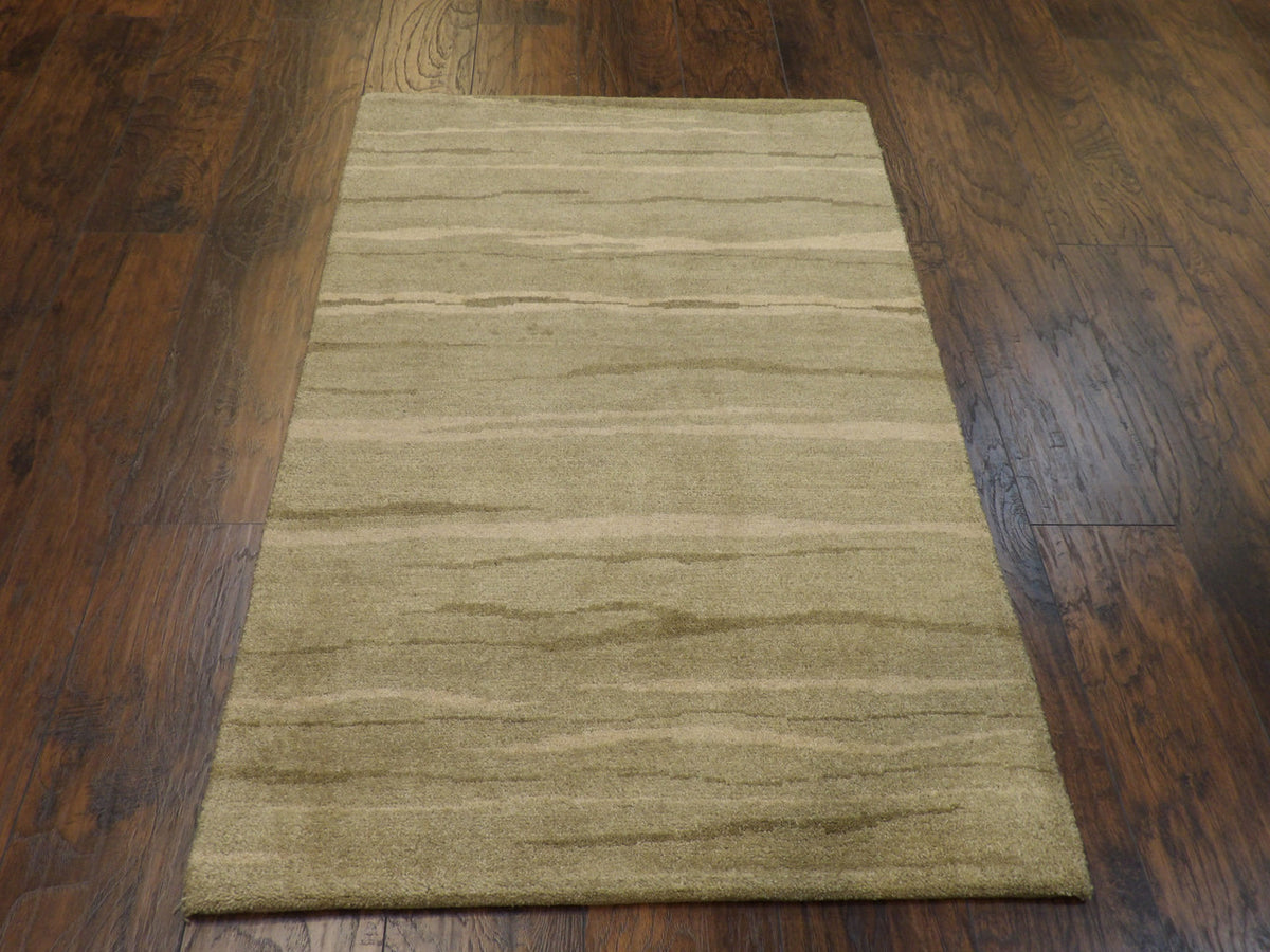 Back of hand-knotted modern rug showing construction