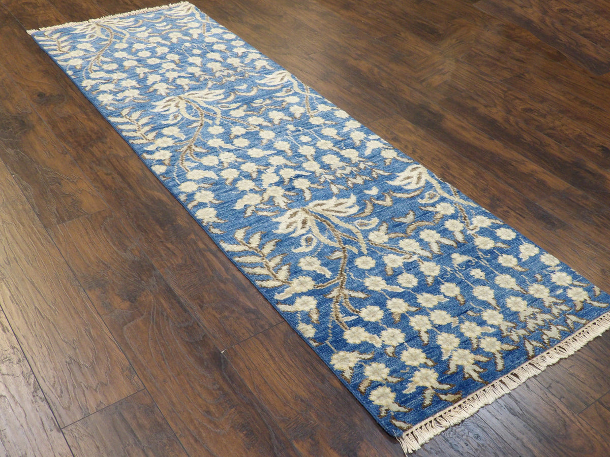 Blue floral runner in a hallway setting
