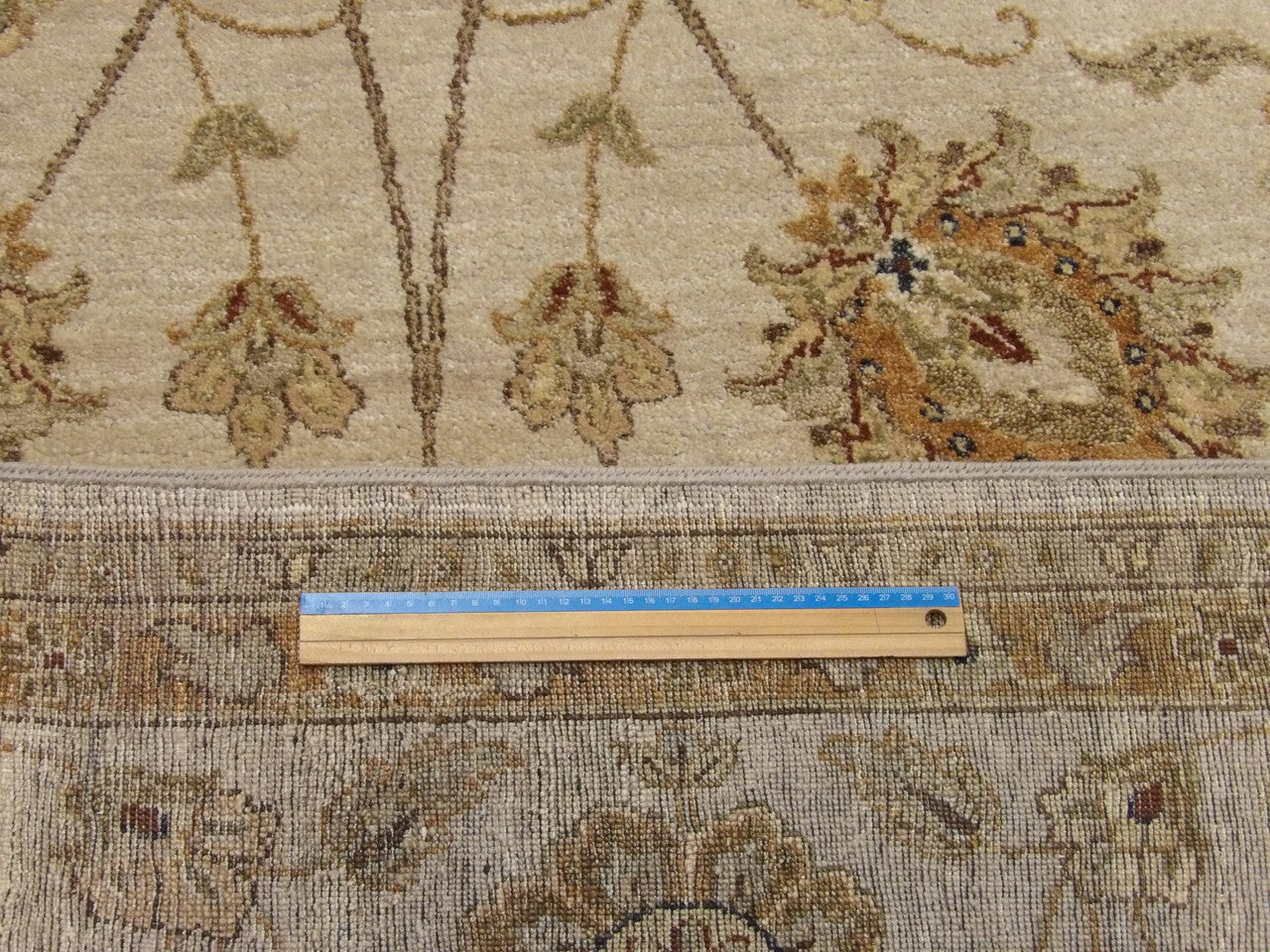 Beige Agra Ziegler rug in room setting