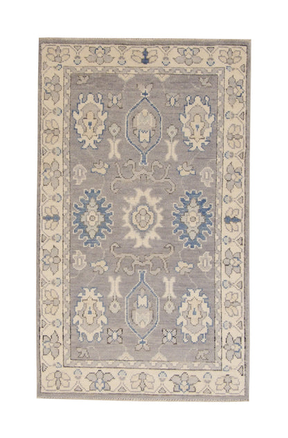 Oushak Chobi hand-knotted wool rug in Gray & Beige, full view