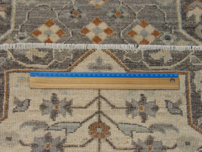 Brown & Beige Oushak Chobi rug in room setting