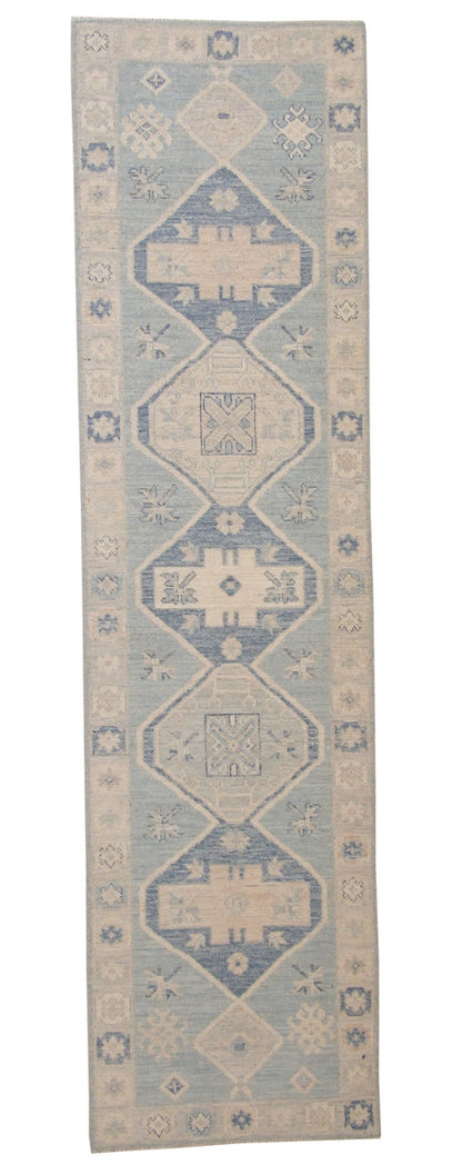 Oushak Chobi hand-knotted wool rug in Blue, full view