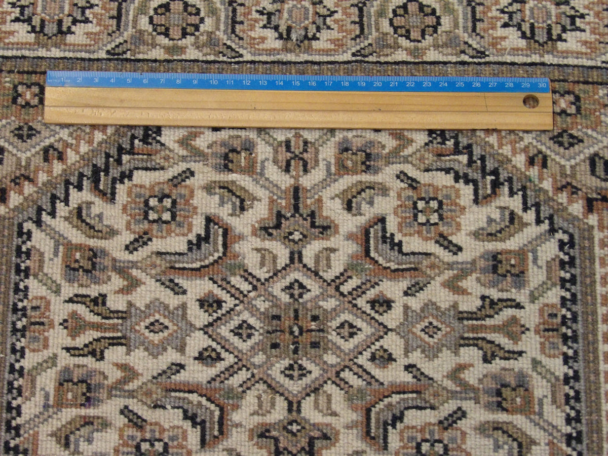 Ivory Fine Persian Bidjar rug in room setting