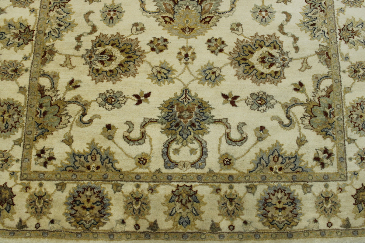 Beige Oushak Indo Ziegler rug in room setting