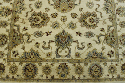 Beige Oushak Indo Ziegler rug in room setting