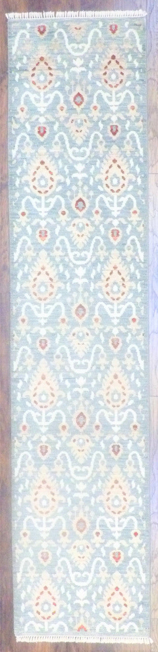 Transitional Ikat hand-knotted wool runner in green and ivory, full view
