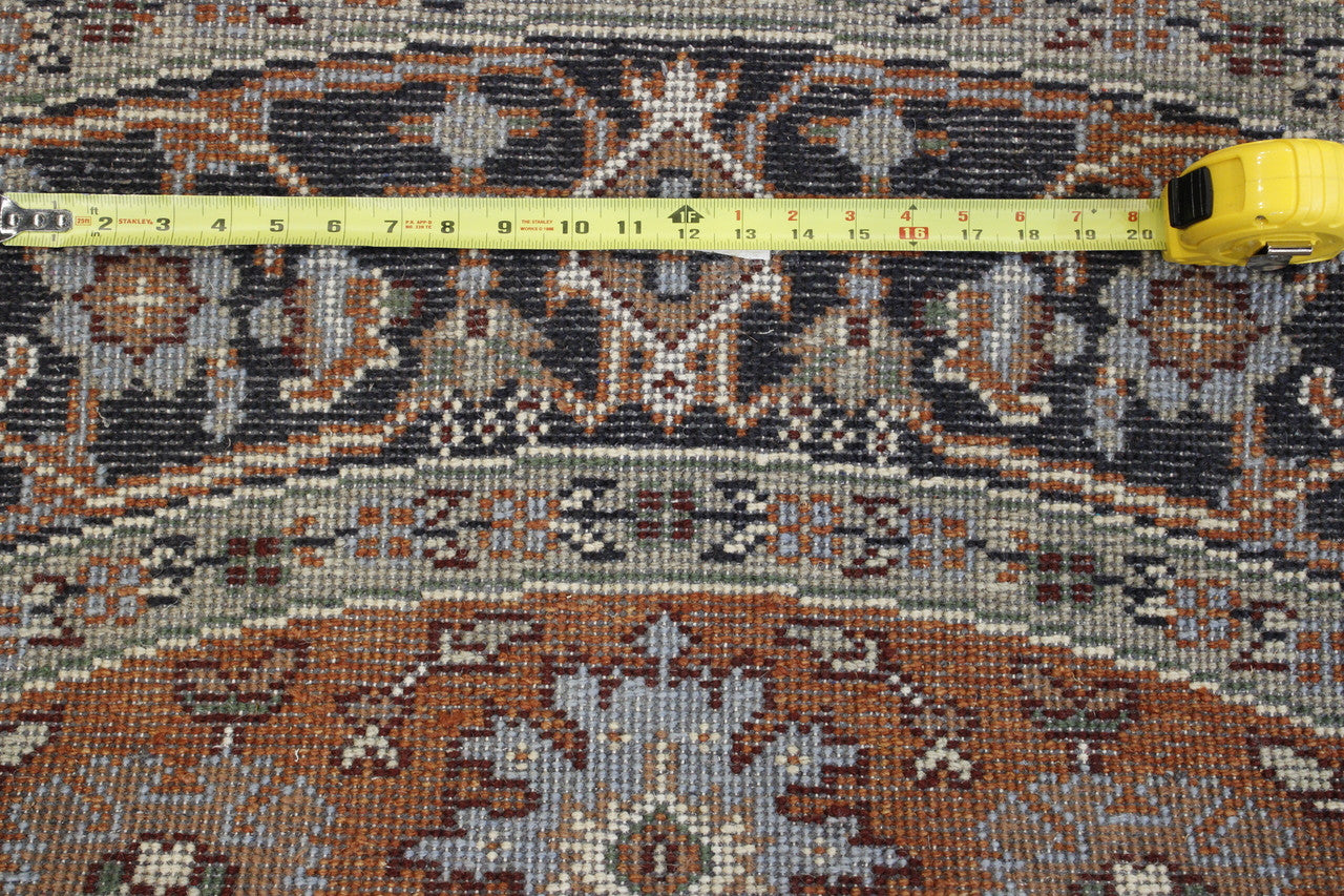Blue & Rust Tribal Indo Heriz rug in room setting