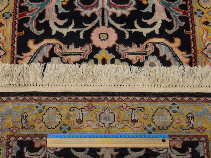 Black & Gold Persian Kashan Antique Wash rug in room setting