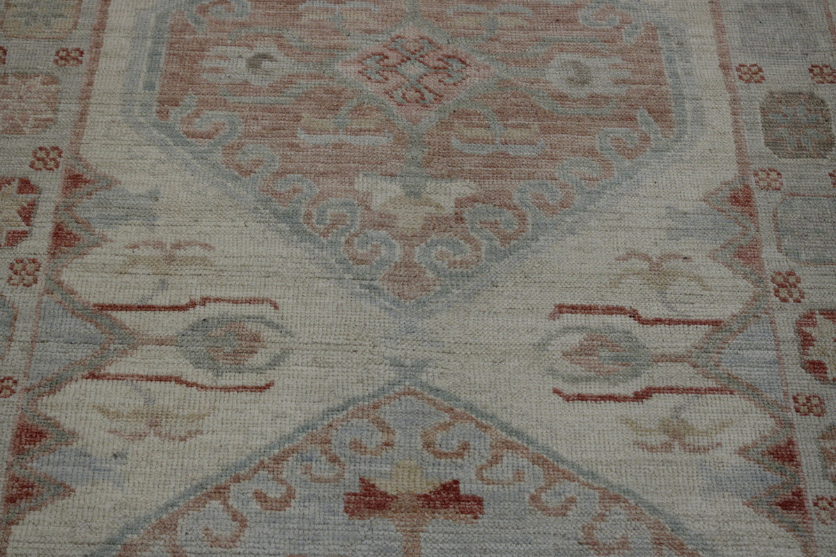 Back of Oushak Chobi hand-knotted rug