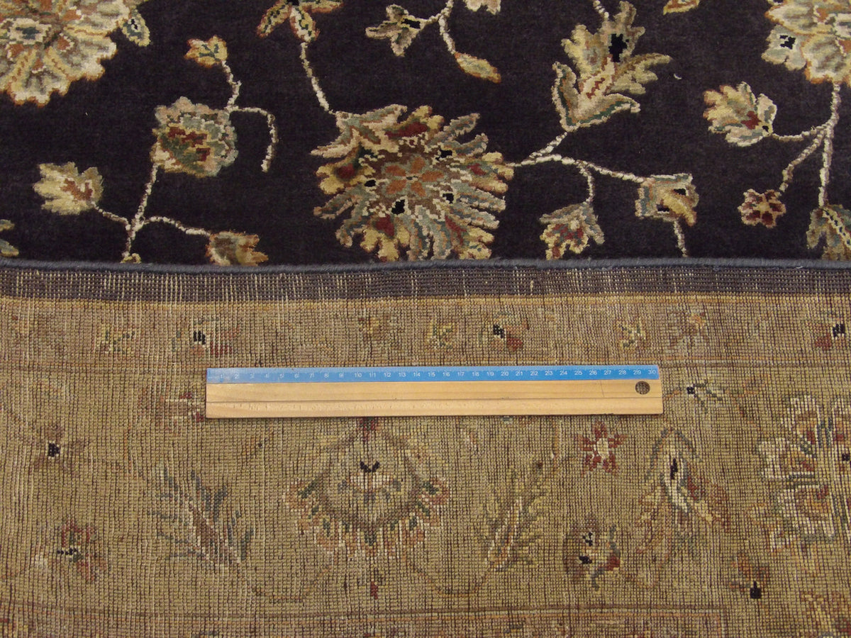 Gold and purple Jaipur rug in room setting
