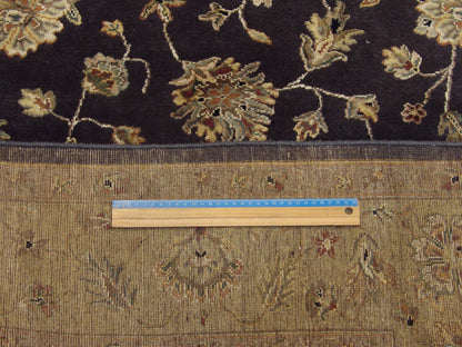 Gold and purple Jaipur rug in room setting