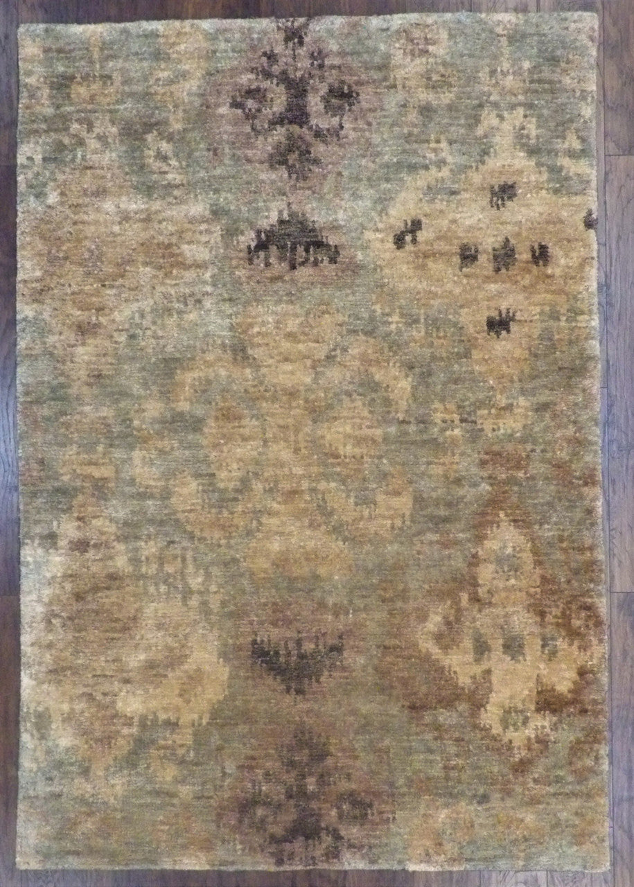 Modern Ikat hand-knotted wool-silk rug in gold and green, full view