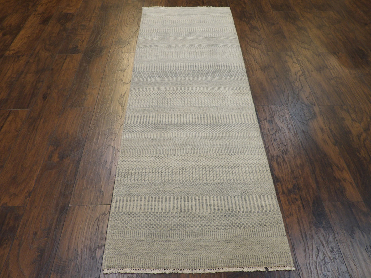 Back of hand-knotted modern runner showing construction