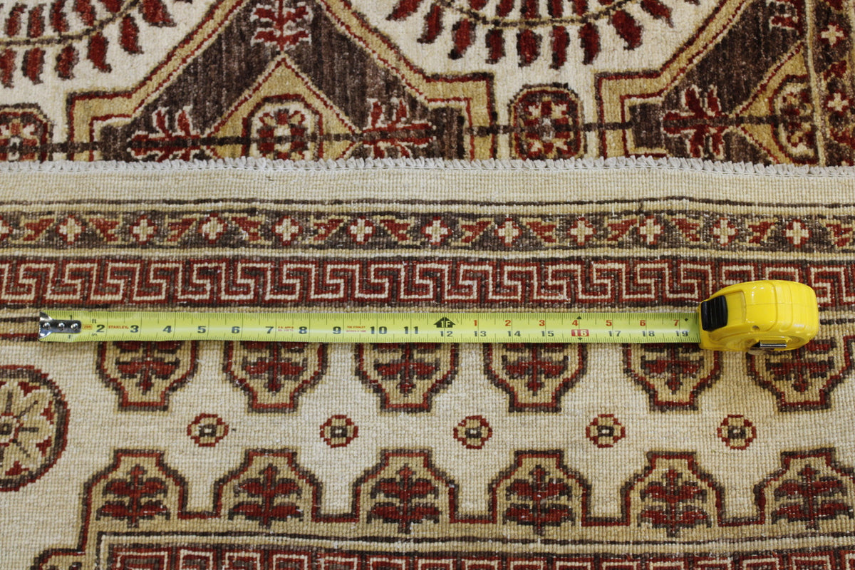 Traditional Khotan Peshawar rug corner detail