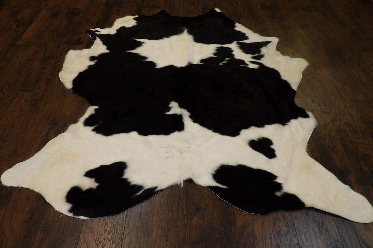 Back of genuine cowhide rug showing hide backing