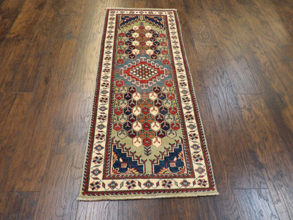 Full length view of tribal Kazak runner
