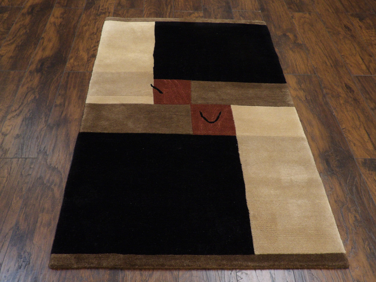 Close-up of wool pile, Black & Beige rug
