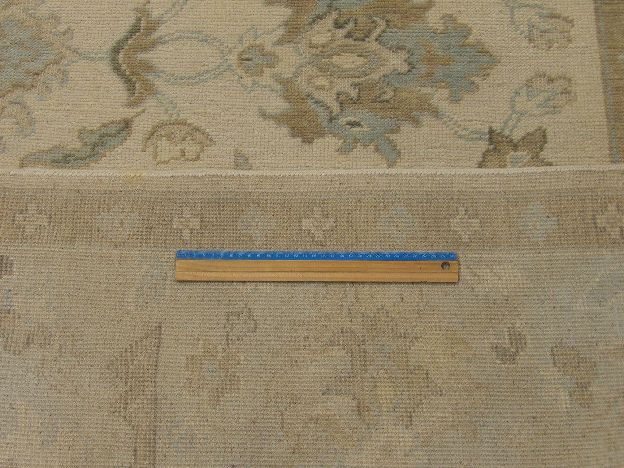 Blue & Beige Oushak Chobi Wash rug in room setting