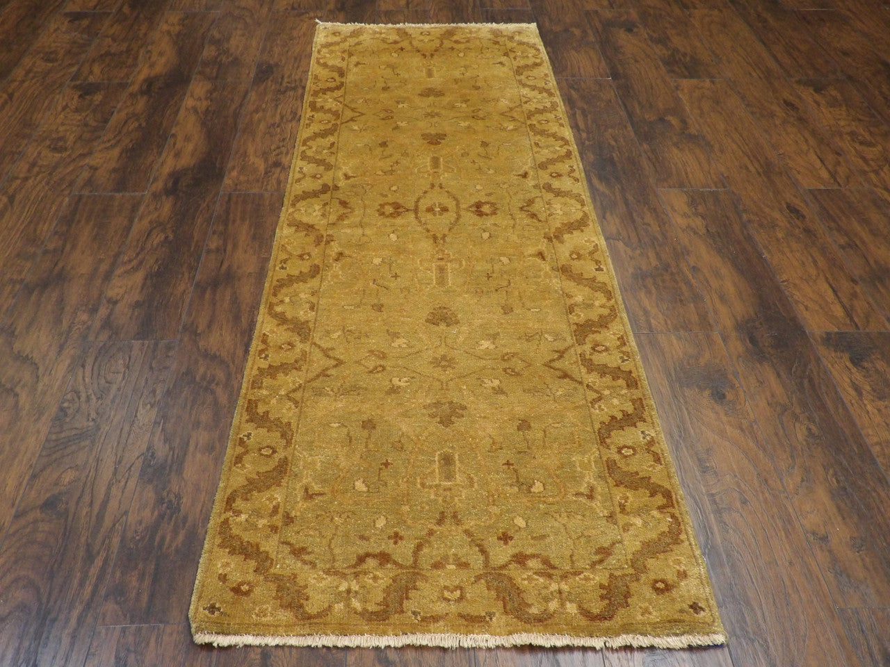 Close-up of wool pile, brown and gold runner