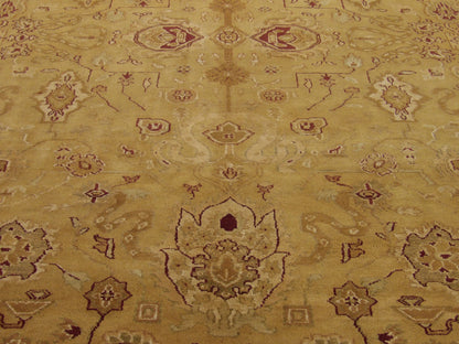 Close-up of wool pile, gold and pink rug