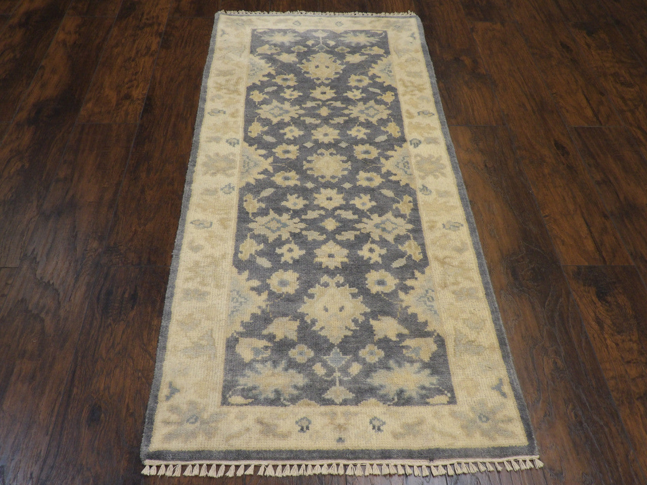 Back of Wash Turk Oushak hand-knotted rug