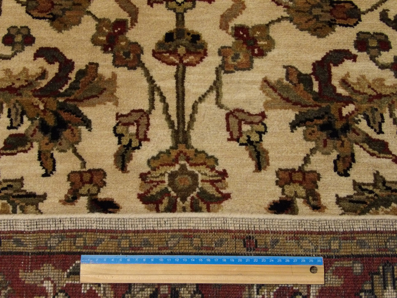 Beige and red Jaipur Kashan rug in room setting