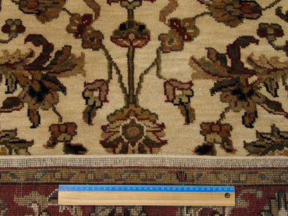 Beige and red Jaipur Kashan rug in room setting