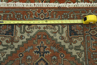 Rust Tribal Heriz rug in room setting