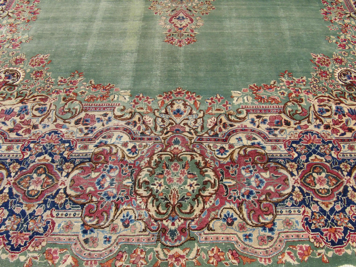 Antique Persian Kerman rug corner detail
