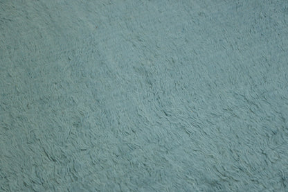 Close-up of wool pile, Teal rug