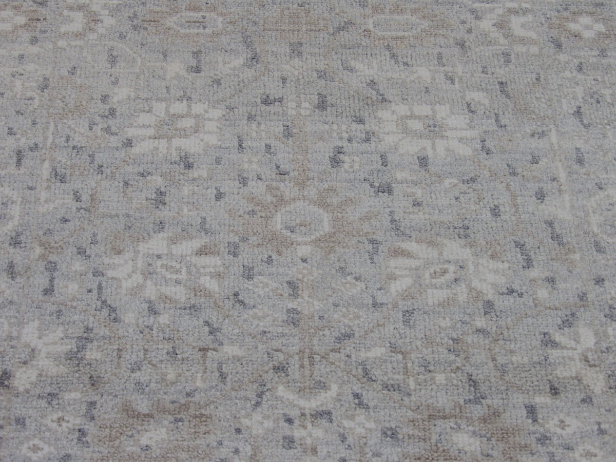 Back of Silky Oushak Wash hand-knotted rug