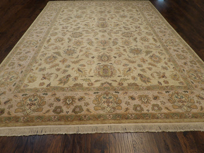 Close-up of wool pile, gold and pink rug