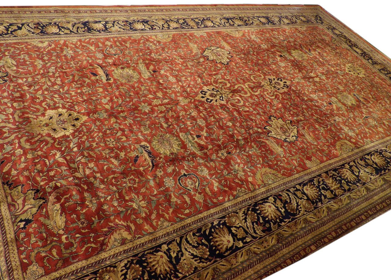 Farhan design medallion detail, blue and red hand-knotted rug