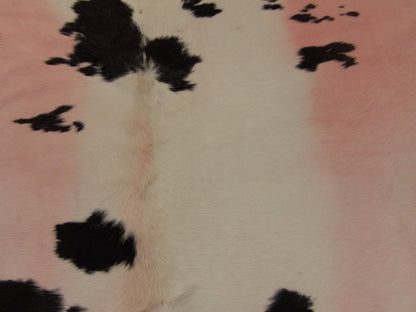 Cowhide texture close-up, pink natural markings