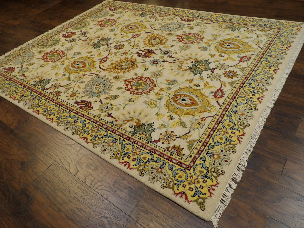Gold Ziegler rug in a contemporary room setting