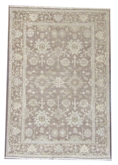 Turkish Oushak hand-knotted wool rug in brown and green, full view