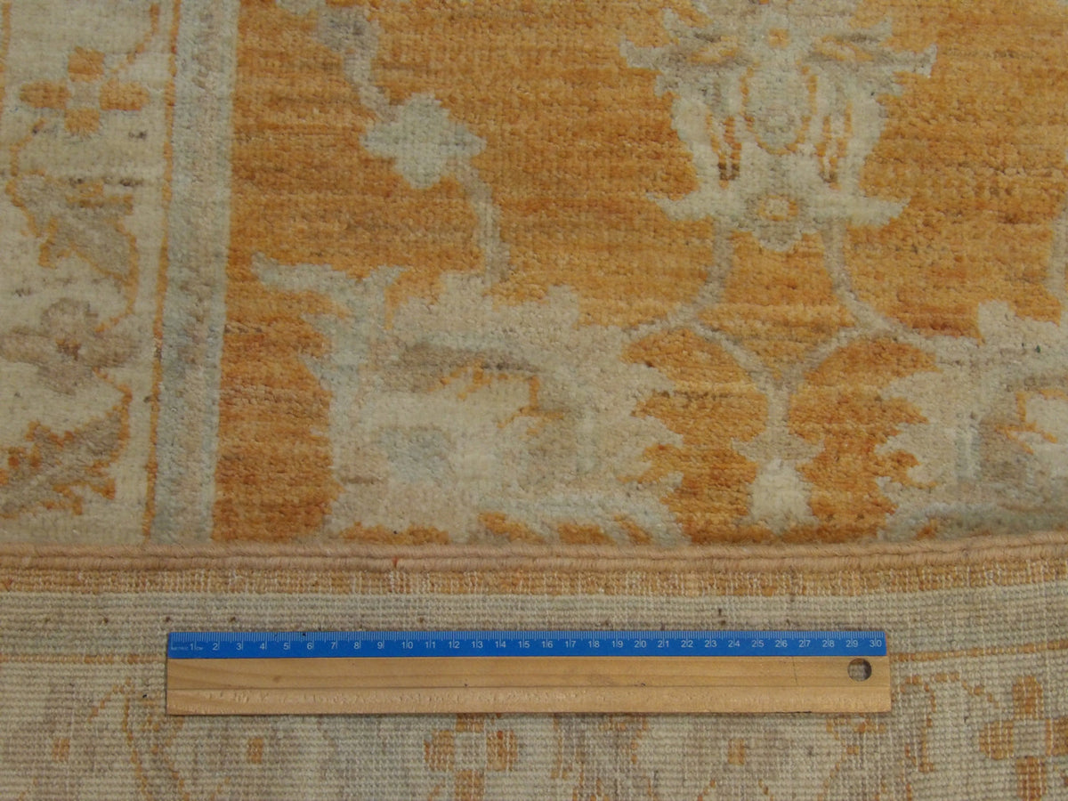 Beige & Rust Wash Oushak Chobi rug in room setting