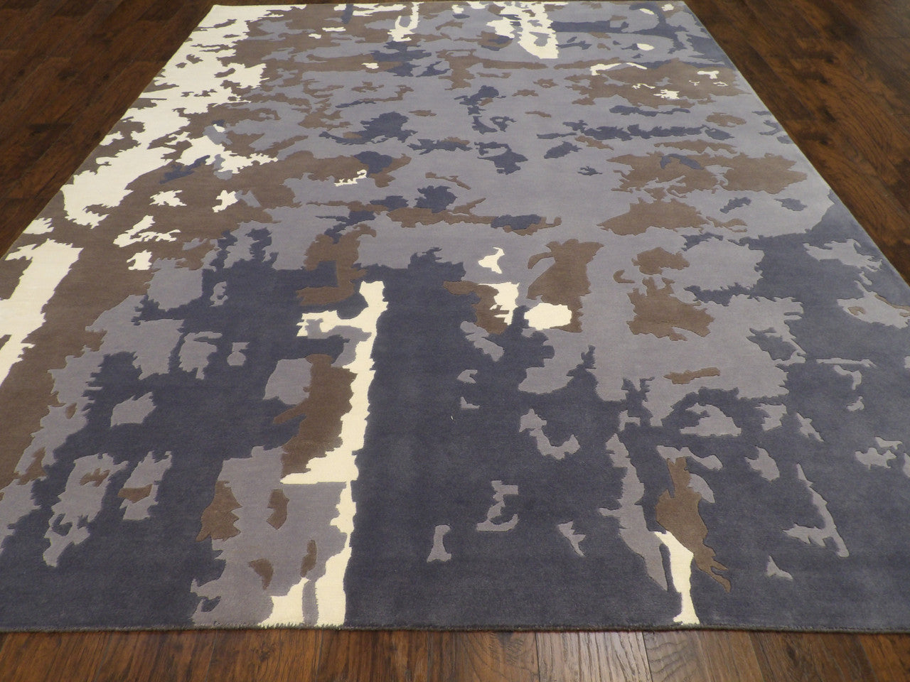 Close-up of wool-silk sheen on abstract marble rug