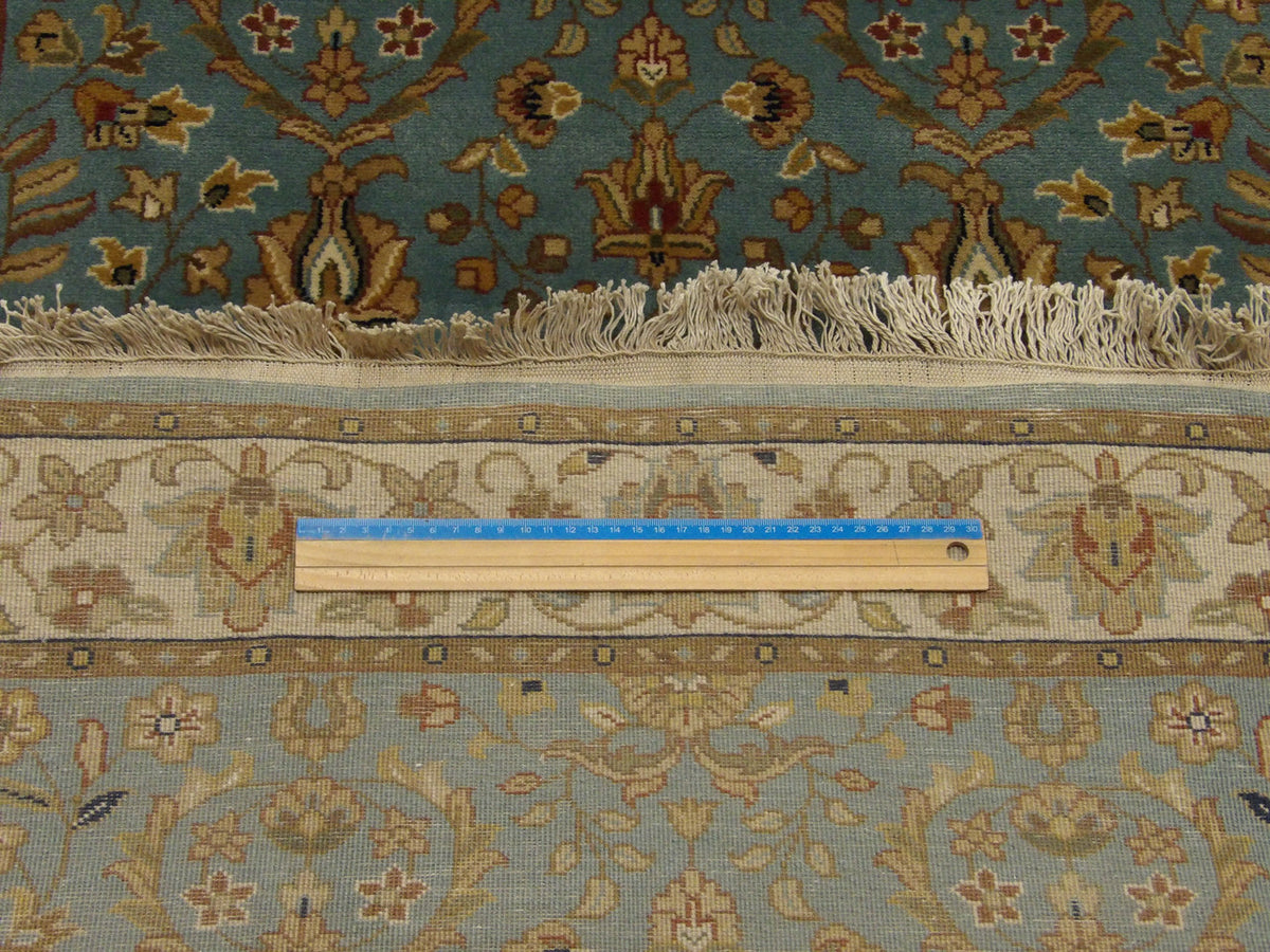 Blue & Beige Fine Persian Kashan rug in room setting